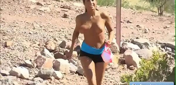  Sexy natural big tit redhead amateur Stacy goes for a run in the sun and toy her juicy pussy by some rocks